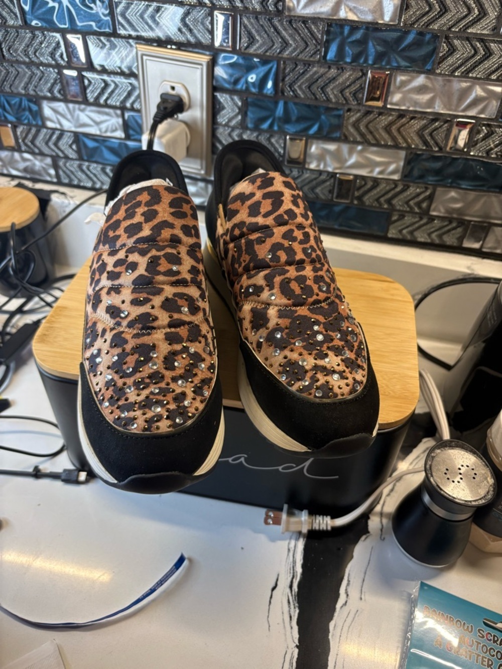Kenneth Cole Leopard Print Slip-On Sneakers in Brown and Black